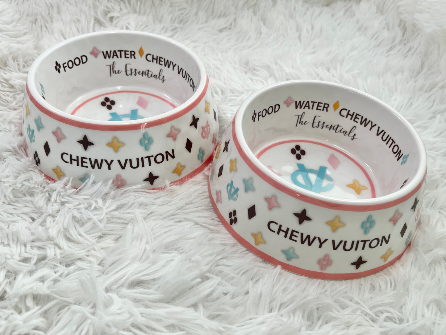 Introducing chic and stylish dog bowls. Our brand new Bowl is how you create a beautiful dining experience for someone who eats on the floor.   *Please note, bowls are sold individually and not as a set*  White Chewy Vuiton Bowl    Checker pattern Chewy Vuiton Bowl  Starbarks Bowl  Chip-resistant Melamine Construction BPA-Free One Size Only (23 oz./2.5 cups) Non-skid bottom Side cutout for easy pickup
